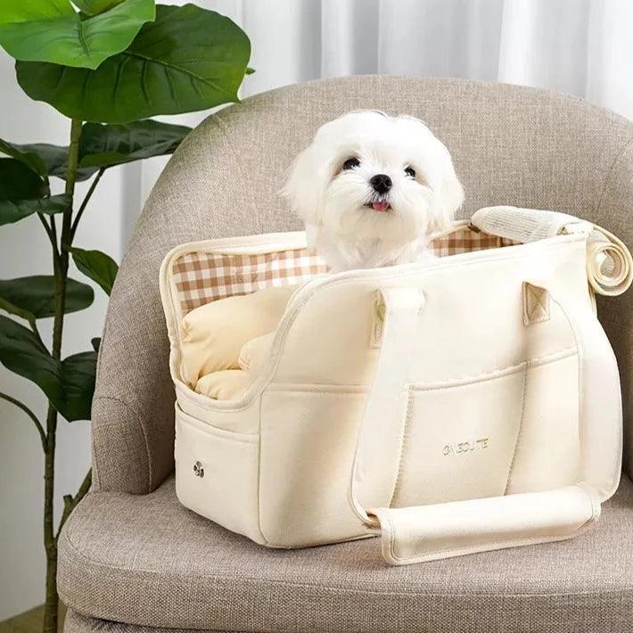 Beige cloth bag with a picture of a dog. Convenient for walking good the dog and shopping.